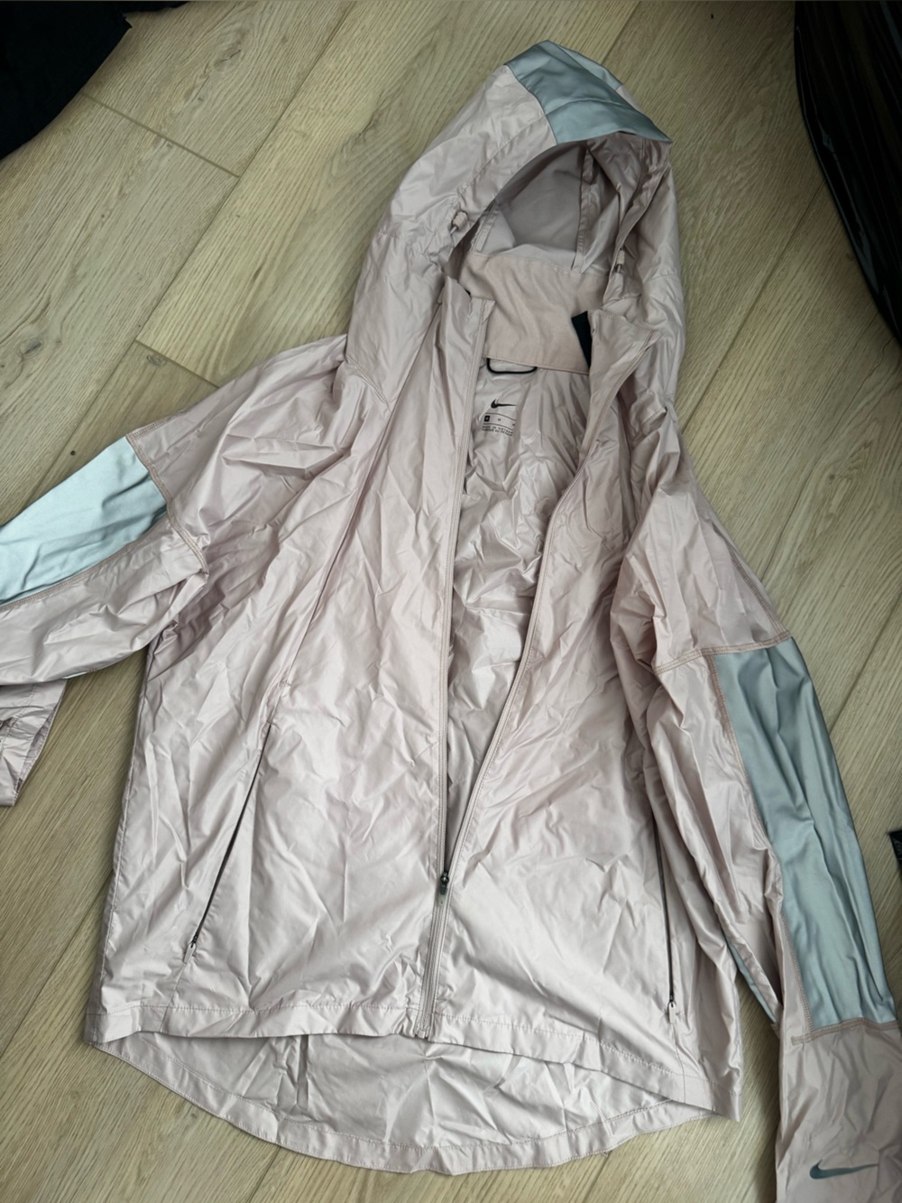 Nike Women's Light Pink Hooded Windbreaker with Pale Gray Accents